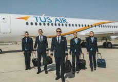 Tus Air Fokker 100 - Crew Stewardess - postcard