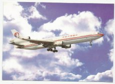 Airline issue postcard - China Eastern Airlines MD-11