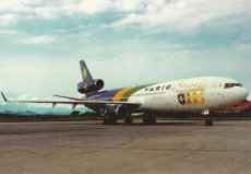 Airline issue postcard - Varig Brasil MD-11