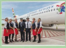 Cayman Airways Boeing 737 - Crew Stewardess - post Cayman Airways Boeing 737 - Crew Stewardess - postcard