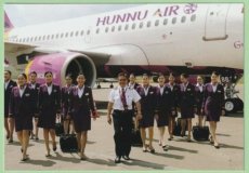 Hunnu Air Airbus A319 - Crew Stewardess - postcar Hunnu Air Airbus A319 - Crew Stewardess - postcard