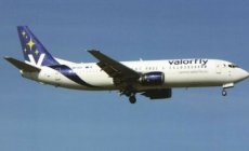 Valorfly Boeing 737-400 9H-VLA landing @ Lisbon Valorfly Boeing 737-400 9H-VLA landing @ Lisbon postcard